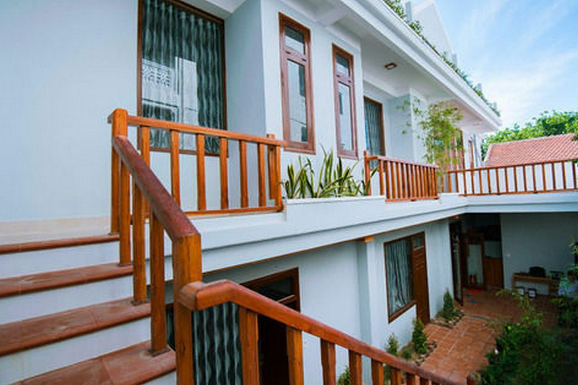 Hospedagem domiciliar Riverside Plum Garden Hoi An
