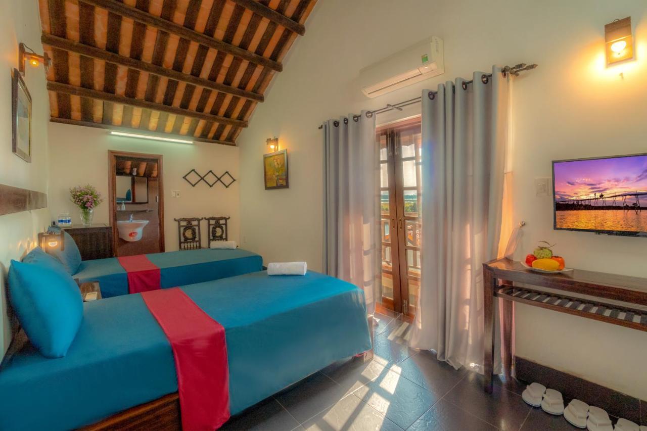 Calm House Hotel Hoi An 1